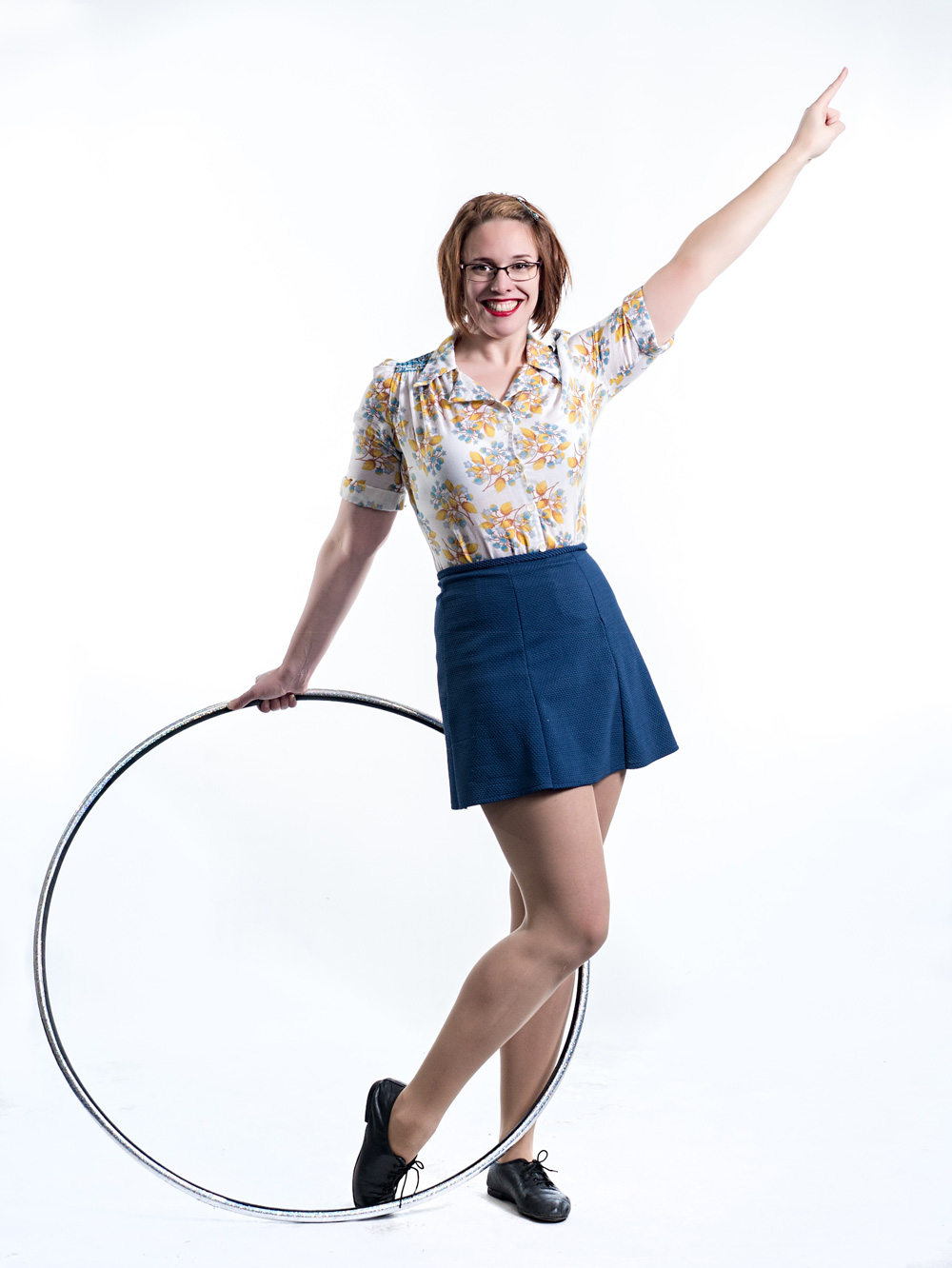 Entertainment services: comedy hula hoop act