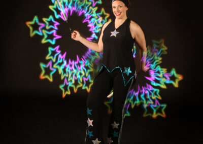 Kat Collett trad circus costume with LED poi